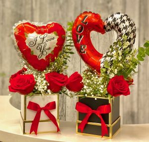 Romantic Surprises: A Bouquet of Red Roses with a Balloon in a Gift Box